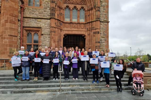 Early years workers and campaigners protesting against the proposed cuts to the Pathway Fund, which has now been reversed.