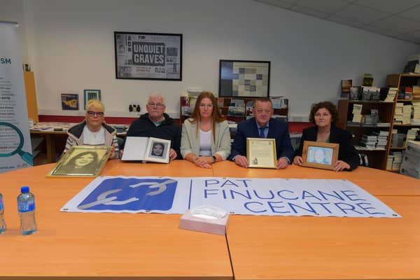 Sara Duddy, from the Pat Finucane (centre), sits alongside May and Martin McGavigan and Billy McGreanery and Marjorie Roddy in the Pat Finucane Centre on Monday afternoon waiting to hear if the PPS intend to prosecute the soldier who shot and killed their relatives Annette McGavigan and Billy McGreanery. Photo: George Sweeney