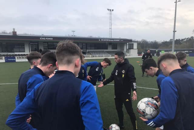 Coach Neil McCafferty, talks to the Northern Ireland U16 team during last week’s training camp in Belgium, were they beat South Africa and Luxembourg and lost to Poland.