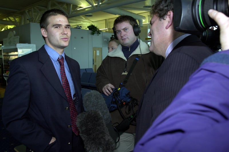Manchester Utd and Northern Ireland international, David Healy, surrounded by the media on his arrival at City of Derry Airport.