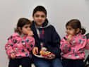 Enjoying some food at the North West Islamic Association’s Tea and Tour day in Pennyburn on Sunday last. Photo: George Sweeney. DER2311GS – 03