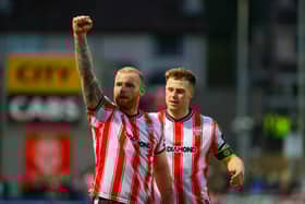 Mark Connolly, pictured with Grimsby's new signing Cameron McJannet, was a summer transfer which proved hugely successful for Ruaidhri Higgins.