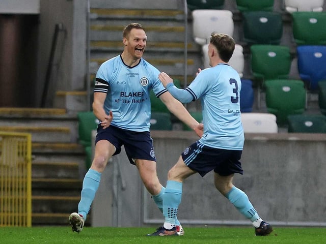 Enniskillen captain Cathal Beacom celebrates the first of his two goals during Friday's fonaCAB Craig Stanfield Irish Junior Cup final at Windsor Park. (Photo: IFA)