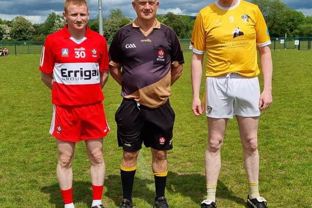 Derry Masters captain Jimmy O'Connor and his Antrim counterpart at the coin toss