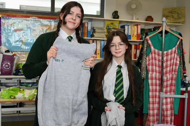 St Cecilia’s College pupils Clodagh and Nakita browse the pre-loved clothing at the Swap Shop, held in the school on Wednesday morning. Photo: George Sweeney