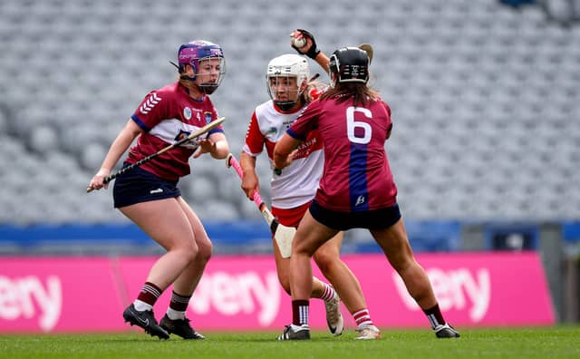Derry’s Aoife Shawe and Muireann Scally of Westmeath battle during Sunday's Very Camogie League Division 2A Final in Croke Park. (Photos: INPHO/Ryan Byrne)