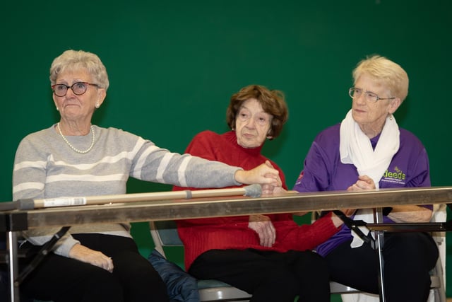 A group enjoying the performance of the Mellow Deeds Choir's performance on Friday morning.