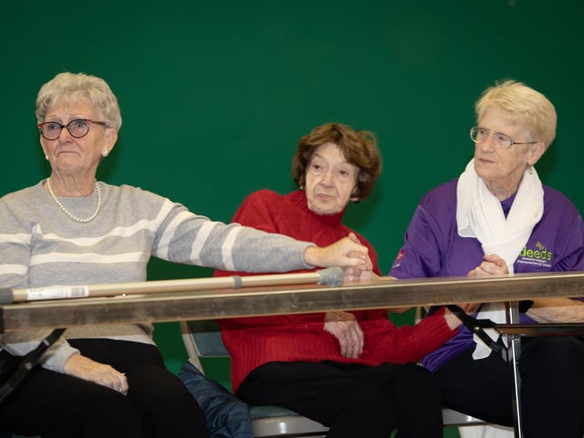 A group enjoying the performance of the Mellow Deeds Choir's performance on Friday morning.