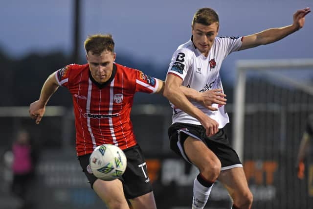 Derry’s Cameron McJannet and Daniel Kelly of Dundalk. Photo: Ciaran Culligan