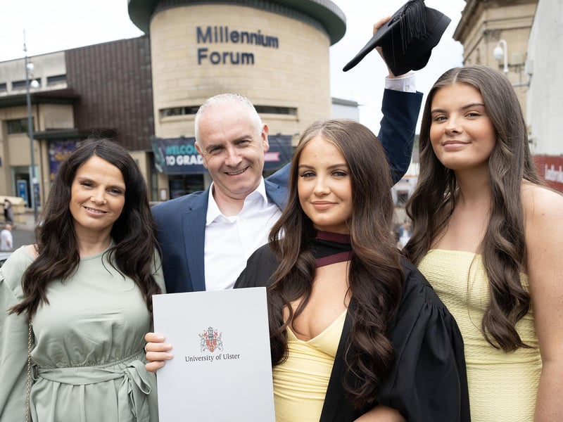 Law graduate Kaitlin Niamh Kelly celebrates with family as she graduates from Ulster University in Derry on Monday July 8.  (Photo: Nigel McDowell / Ulster University)