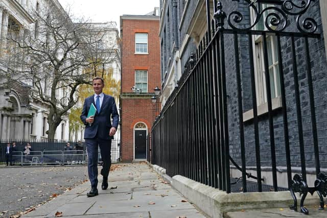 LONDON, ENGLAND - NOVEMBER 22:  Chancellor of the Exchequer Jeremy Hunt leaves 11 Downing Street on November 22, 2023 in London, England. Jeremy Hunt aims to present a growth-focused fiscal plan, leveraging the recent drop in inflation, against the backdrop of Rishi Sunak's speech on Monday, emphasizing the critical choices needed to rejuvenate stagnating economic growth. (Photo by Stefan Rousseau - WPA Pool /Getty Images)