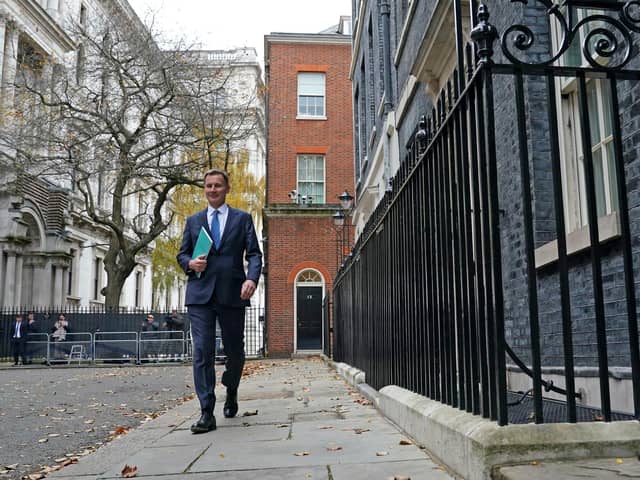 LONDON, ENGLAND - NOVEMBER 22:  Chancellor of the Exchequer Jeremy Hunt leaves 11 Downing Street on November 22, 2023 in London, England. Jeremy Hunt aims to present a growth-focused fiscal plan, leveraging the recent drop in inflation, against the backdrop of Rishi Sunak's speech on Monday, emphasizing the critical choices needed to rejuvenate stagnating economic growth. (Photo by Stefan Rousseau - WPA Pool /Getty Images)