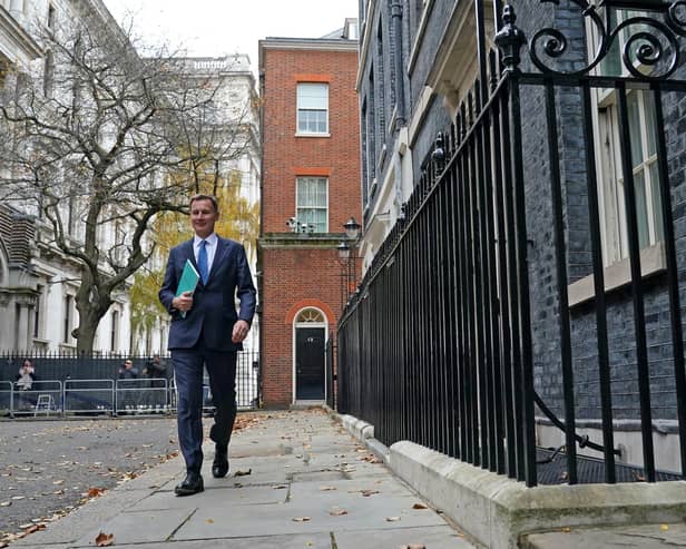 LONDON, ENGLAND - NOVEMBER 22:  Chancellor of the Exchequer Jeremy Hunt leaves 11 Downing Street on November 22, 2023 in London, England. Jeremy Hunt aims to present a growth-focused fiscal plan, leveraging the recent drop in inflation, against the backdrop of Rishi Sunak's speech on Monday, emphasizing the critical choices needed to rejuvenate stagnating economic growth. (Photo by Stefan Rousseau - WPA Pool /Getty Images)