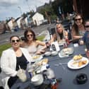 This family enjoying the food on offer at Sunday's Feile 24 event - 'Fest-Hive-Al' at the Gasyard Park, Derry.