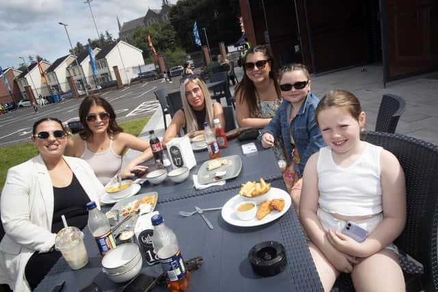 This family enjoying the food on offer at Sunday's Feile 24 event - 'Fest-Hive-Al' at the Gasyard Park, Derry.
