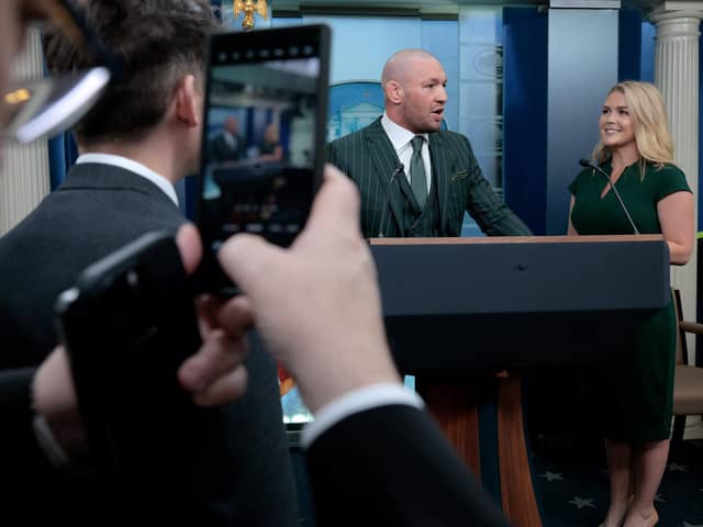 WASHINGTON, DC - MARCH 17: Former UFC champion Conor McGregor briefly speaks with reporters alongside White House Press Secretary Karoline Leavitt before meeting with President Donald Trump in the Brady Press Briefing Room at the White House on Saint Patrick's Day, March 17, 2025. (Photo by Chip Somodevilla/Getty Images)