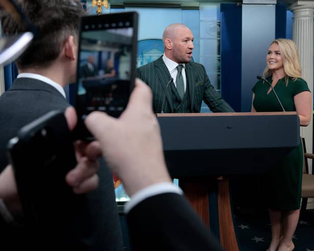 WASHINGTON, DC - MARCH 17: Former UFC champion Conor McGregor briefly speaks with reporters alongside White House Press Secretary Karoline Leavitt before meeting with President Donald Trump in the Brady Press Briefing Room at the White House on Saint Patrick's Day, March 17, 2025. (Photo by Chip Somodevilla/Getty Images)