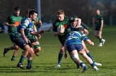 City of Derry’s David Lapsley in the thick of the action against Grosvenor at Judges Road on Saturday. Photo: George Sweeney