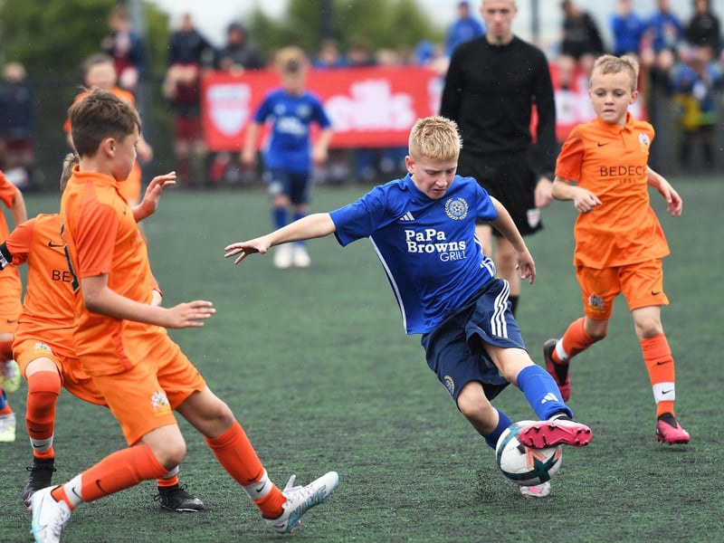 Shankill Youths player Kylan Morrison in action during the O'Neills Foyle Cup Under-11's final at the Bishop's Field.