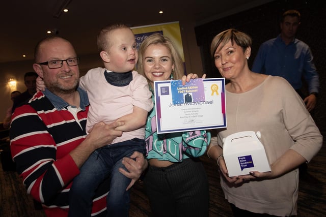 Jonah and his parents gladly accept his award from Derry Girls star Saoirse Monica Jackson on Tuesday evening at the FDST Night of Celebration.