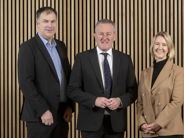 Economy Minister Conor Murphy is pictured with Brendan McGuigan, Director of Advanced Manufacturing and Engineering at Invest NI, and Caoimhe Keogan, Chief People Officer, AVEVA.