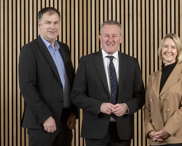 Economy Minister Conor Murphy is pictured with Brendan McGuigan, Director of Advanced Manufacturing and Engineering at Invest NI, and Caoimhe Keogan, Chief People Officer, AVEVA.