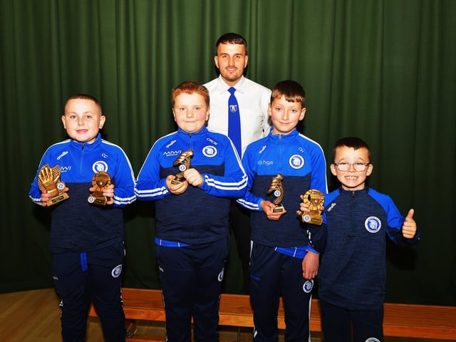 Vice-chairperson Diolain Ward pictured with U12 players who received 'Man of The Match' awards at the Trojans FC annual Youth Presentation held in St Cecilia’s College. Photo: George Sweeney
