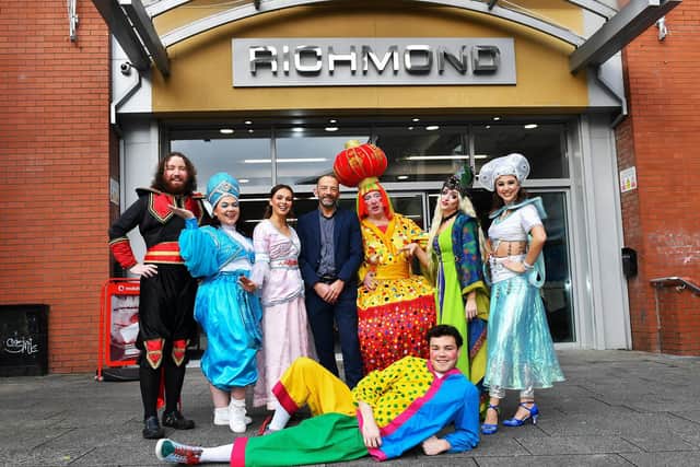 Richmond Shopping Centre manager Bobby Nicholson with the cast members of the Aladdin pantomime during Santa’s visit to the centre on Saturday morning. Photo: George Sweeney