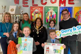 The Mayor of Derry City and Strabane District Council, Councillor Patricia Logue, visited St Anne’s PS, Derry where the Eco-Council led a poster competition on behalf of active travel charity, Sustrans to promote healthy air around schools. Included are St Anne’s PS Vice Principal, Patricia McNutt; Sustrans Active School Travel Officer, Donna McFeely; and Developing Healthy Communities Policy Manager, Joe Newby, along with members of the school Eco-Council and poster competition winners.