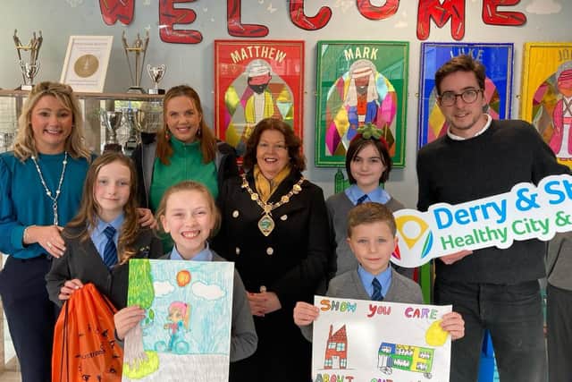 The Mayor of Derry City and Strabane District Council, Councillor Patricia Logue, visited St Anne’s PS, Derry where the Eco-Council led a poster competition on behalf of active travel charity, Sustrans to promote healthy air around schools. Included are St Anne’s PS Vice Principal, Patricia McNutt; Sustrans Active School Travel Officer, Donna McFeely; and Developing Healthy Communities Policy Manager, Joe Newby, along with members of the school Eco-Council and poster competition winners.