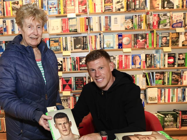 Professional footballer James McClean signing his autobiography, “The Walls” in Waterstones, Foyleside, for Anne Gallagher. (Photo - Tom Heaney, nwpresspics)