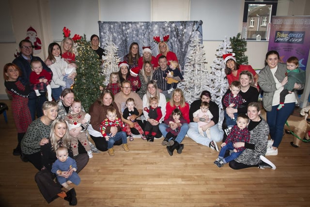 IT’S CHRISTMAS!!!!!. . . . .A section of the parents, children, Gasyard Feile, and Surestart Edenballymore staff pictured at the ‘Christmas Photos and Rhymetime Christmas Extravaganza’ at the Bishop Street Community Centre on Friday last. The event was A Streets Alive project funded by Urban Villages and the organisers issued a special thanks to SureStart, Bishop Street Youth Club and The Balloon Room  for the success of the event. (Photos: Jim McCafferty Photography)