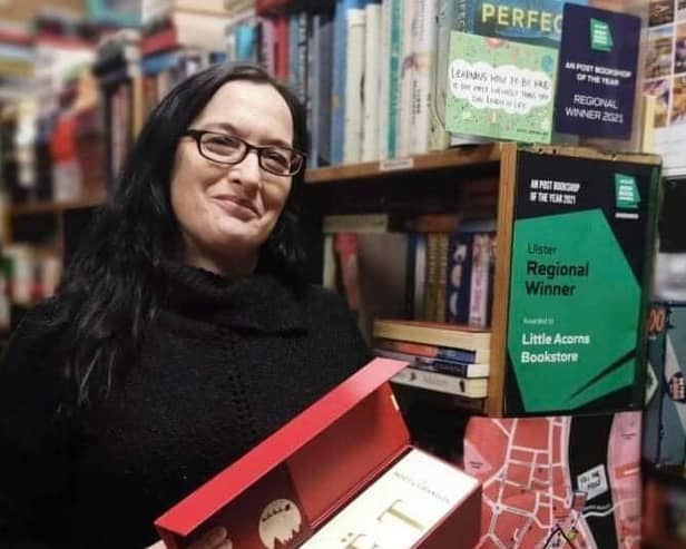 Jenni winning the Regional (Ulster) of the An Post  Irish Bookshop of the Year 2021 in her premises at Foyle Street, Derry
