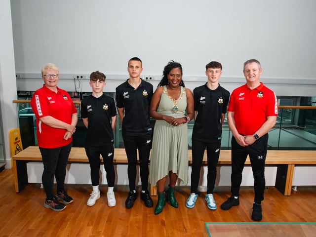 Derry City & Strabane District Council Mayor Lilian Seenoi-Barr pictured with the boys from Castlederg High School. From left to right are Tyrone Club Secretary Mavis Donaghy, boys Charlie Thompson, Chrissy Spratt, Jamie Johnston, and Coach Darin Millar.