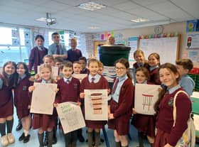 Pictured are pupils from St John’s Primary School with their new Waterbutt.