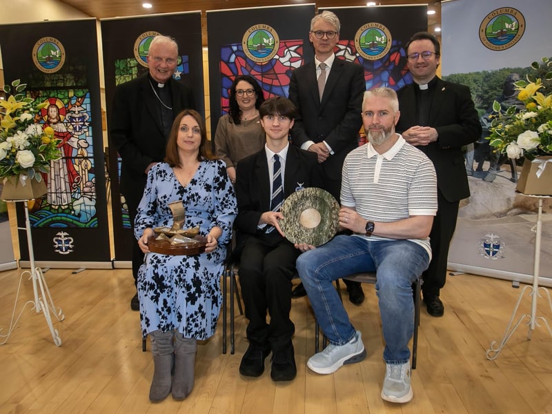 Ryan Nagurski, winner of the Bishop Farren Memorial Prize for Best GCSE Results pictured on Thursday with his parents, Natasha and Ryan. At back are Bishop Donal McKeown, Mrs Caroline McLaughlin (Principal), Mr Brendan McGurk KC (Guest Speaker and Past Pupil), and Fr Stephen Ward (School Chaplain). (Photos: Jim McCafferty Photography) : .