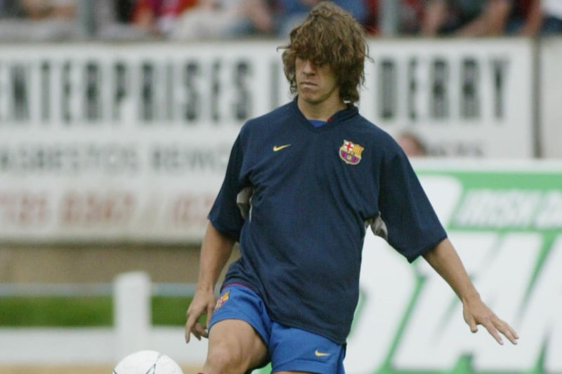 Carles Puyol warms up at the Brandywell.