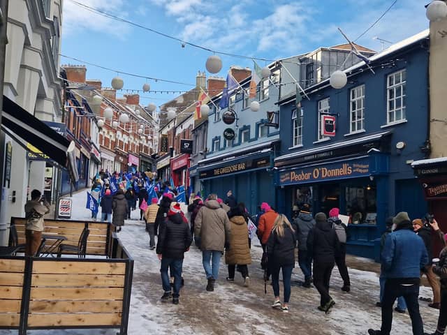 Workers marching up Waterloo Street.