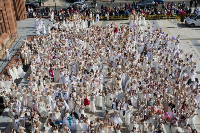 The sight at the Guildhall Square, during the Brides Across The Bridge World Record. 
(2804-GMI-01)