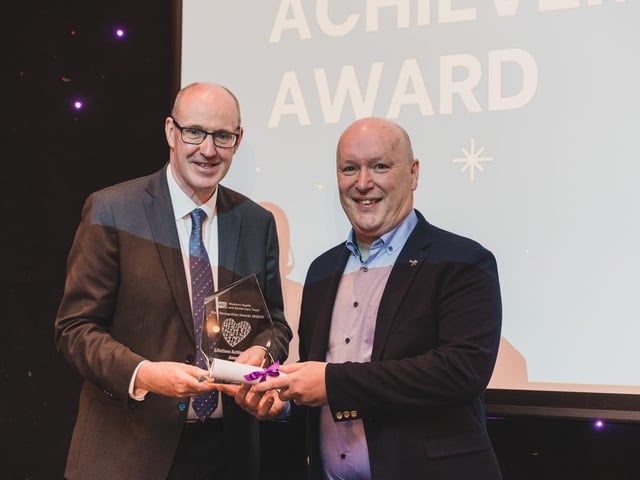 Lifetime Achievement Award Brendan Moore Award Winner, Brendan Moore, retired Principal Pharmacist, Altnagelvin Hospital pictured with Neil Guckian, Chief Executive, Western Trust.