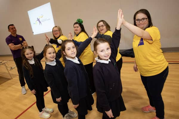 INTERNATIONAL DAY OF PERSONS WITH DISABILITIES. . . .Young people from Foyle Down Syndrome Trust pictured with pupils from Bunscoil Cholmcille. Steelstown, celebrating International Day of Persons with Disabilities at Shantallow Community Centre on Monday morning. (Photos: Jim McCafferty Photography)