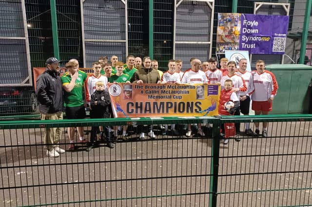 Derry City FC gaffer Ruaidhrí Higgins with players at the Galliagh Community Response Memorial Cup.