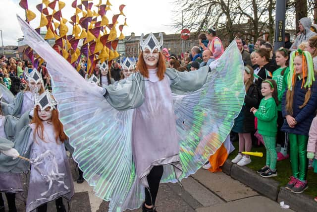 The annual St.Patrick’s Day Spring Carnival reached a climax in Derry as thousands of people came together to watch and take part in the annual event which was led by Derry City and Strabane District Council Mayor, Councillor Sandra Duffy. This years event had a theme of recycling and reusing. Performances included dancing and a wishing well the Peace Garden musical performances in Guildhall Square and Circus acts in the city’s Craft Village as well as a host of colourful characters throughout the city centre. Picture Martin McKeown. 17.03.23