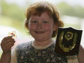 Siobhan O'Connor winner of the tin whistle under 8 and also the most promising player at Moville Feis.  Siobhan is a  student of the McClure School of Music.  (1305JB08)
