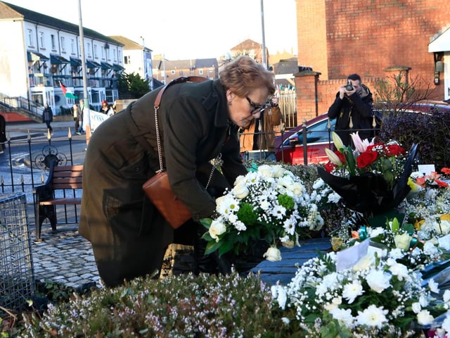 Geraldine Doherty whose nephew Gerard Donaghey was murdered by the British Paras on Bloody Sunday 1972, laying a wreath at the Bloody Sunday monument in Rossville Street at the "Unfinished Business March for Justice". (Photo - Tom Heaney, nwpresspics)
