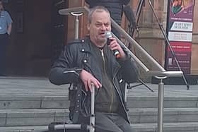Rights campaigner Tony O’Reilly addressing the Disabled People Against Cuts (DPAC) 'Welfare Not Warfare’ demonstration at the Guildhall on Wednesday.