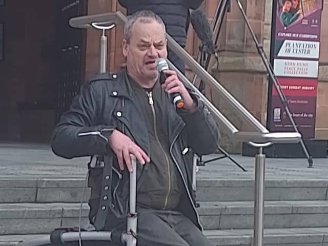 Rights campaigner Tony O’Reilly addressing the Disabled People Against Cuts (DPAC) 'Welfare Not Warfare’ demonstration at the Guildhall on Wednesday.