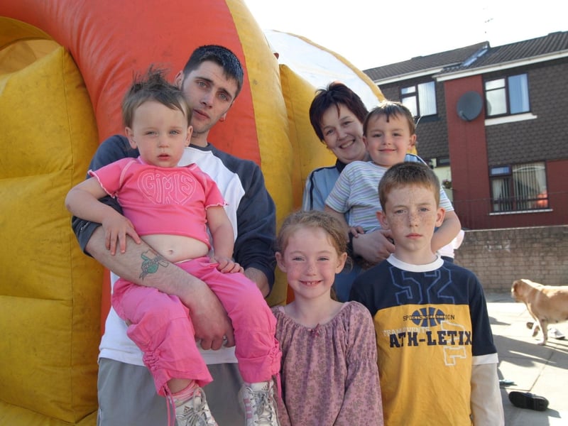 Friends together on the bouncy castle.