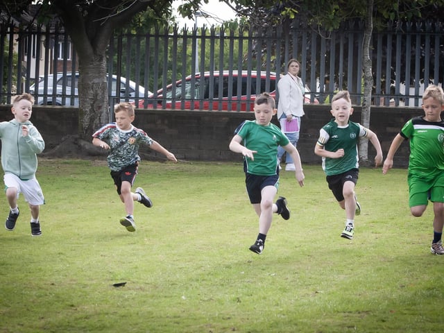 Neck-and-neck in one of the boys races on Wednesday last at Greenhaw PS.