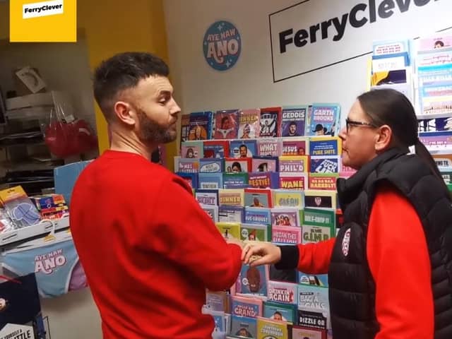 Ferry Clever 'customer' Karen Pyne asking store owner if they have any Cups.